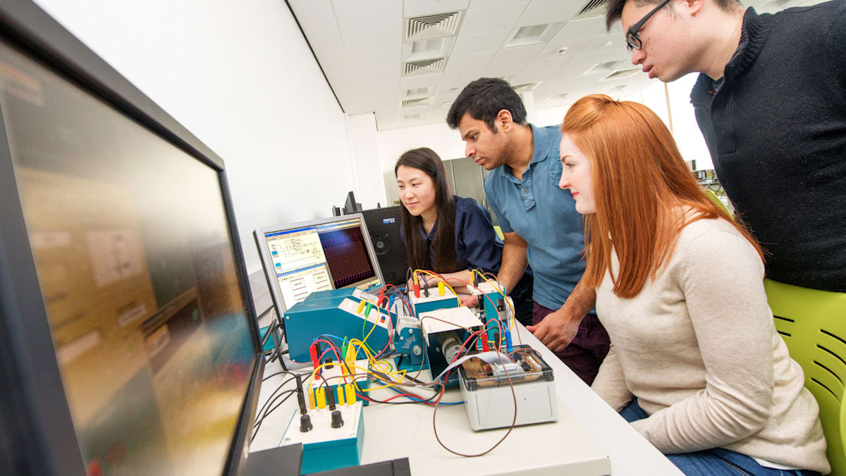 Engineering students working on project