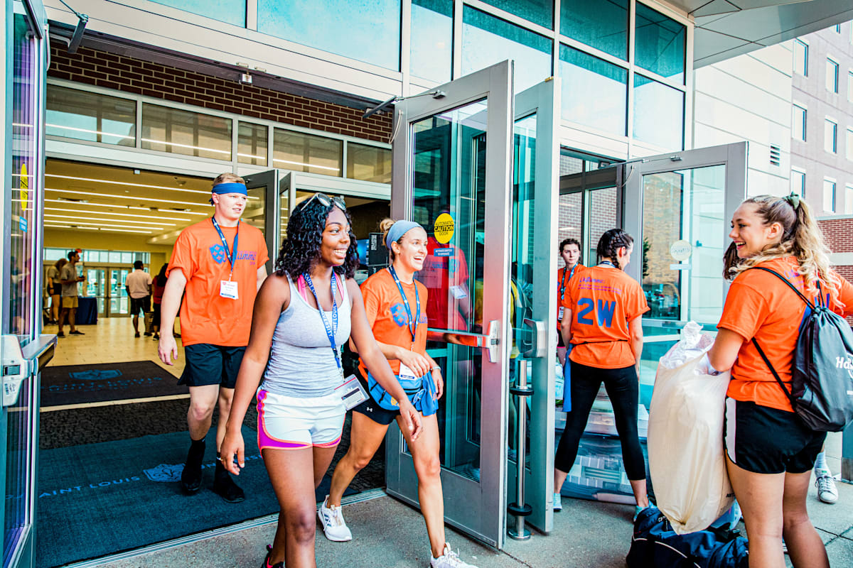 SLU students exiting the building 