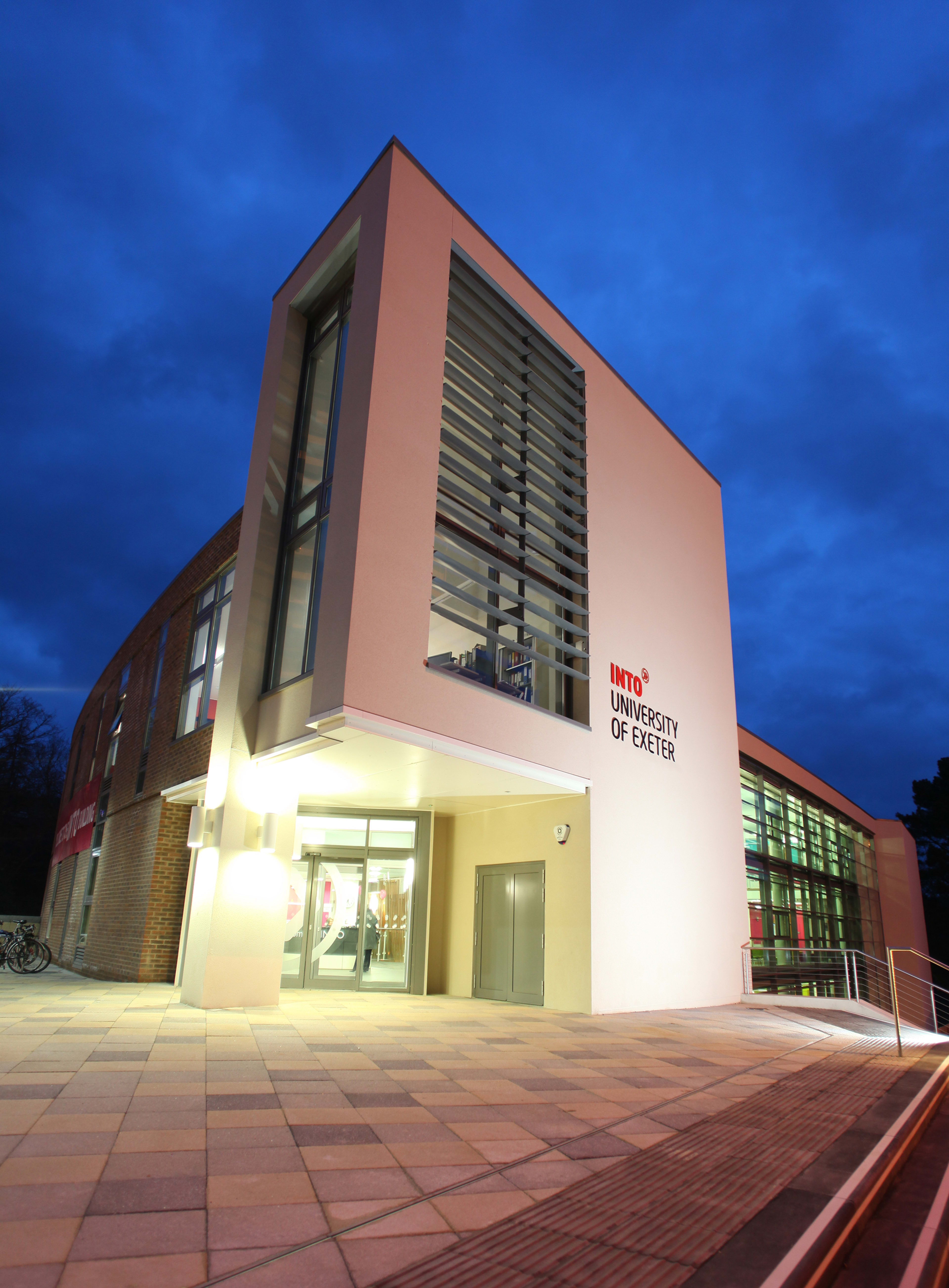 External view of University of Exeter INTO Centre in evening