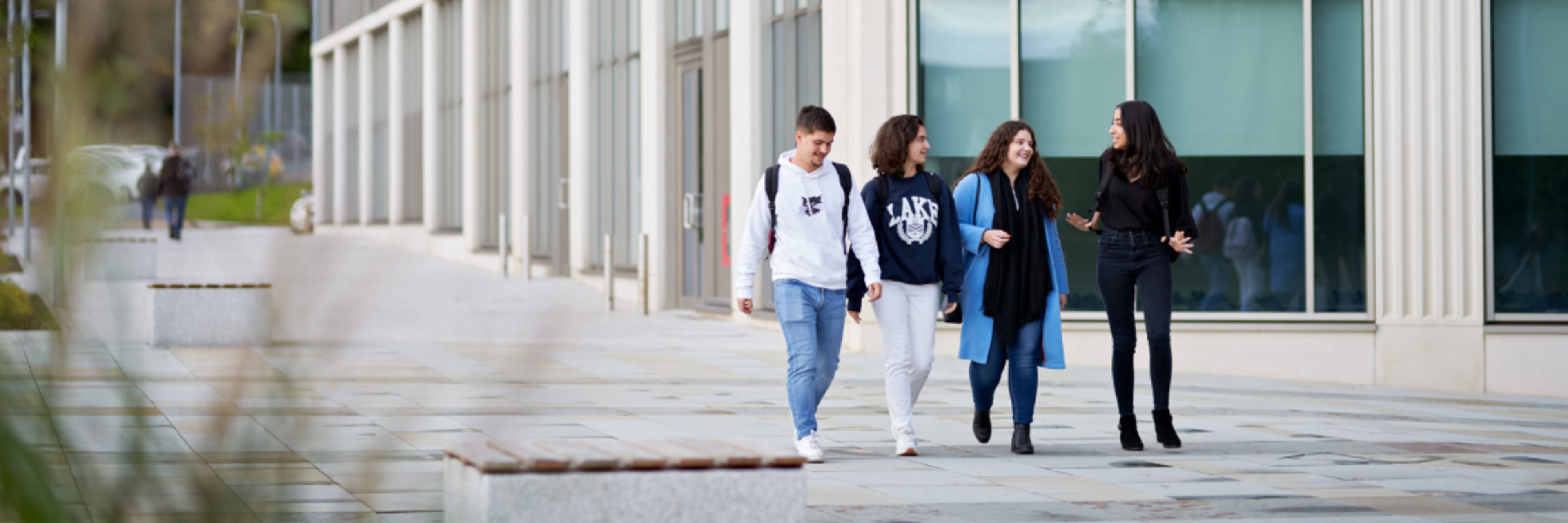 Students walking on campus at Lancaster University