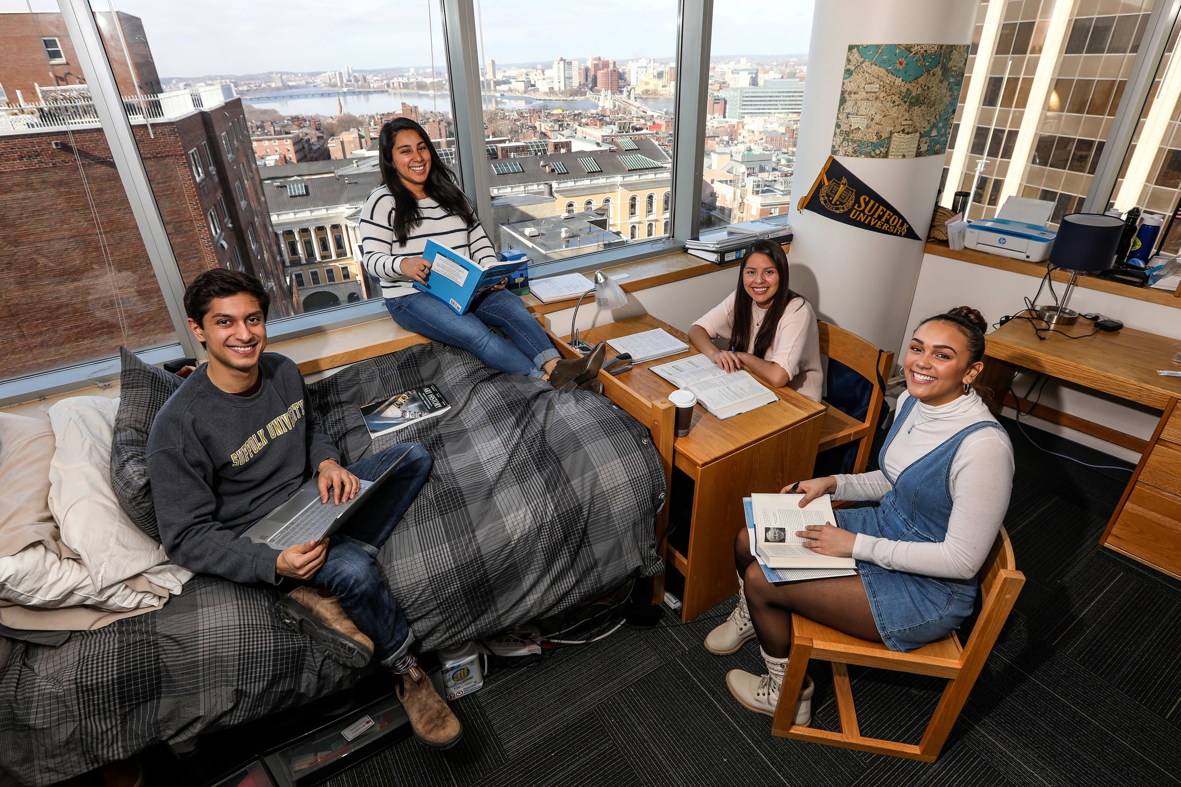 SLU students in residential hall studying