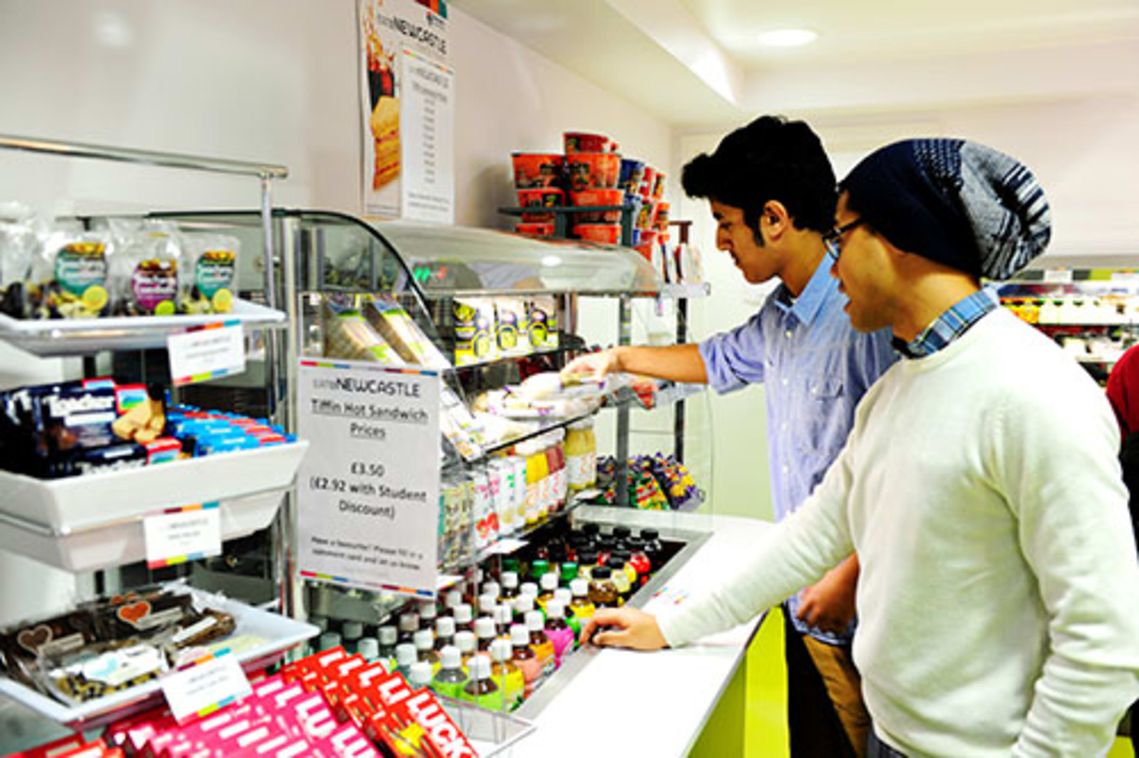 International students choosing food in INTO Center Café