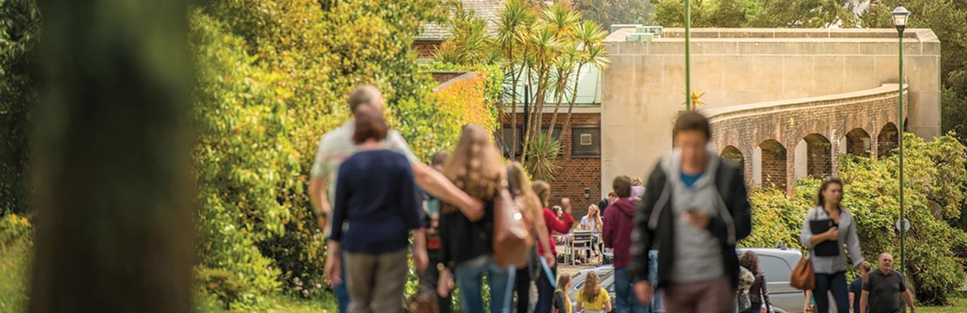 A view of Exeter University students walking on campus
