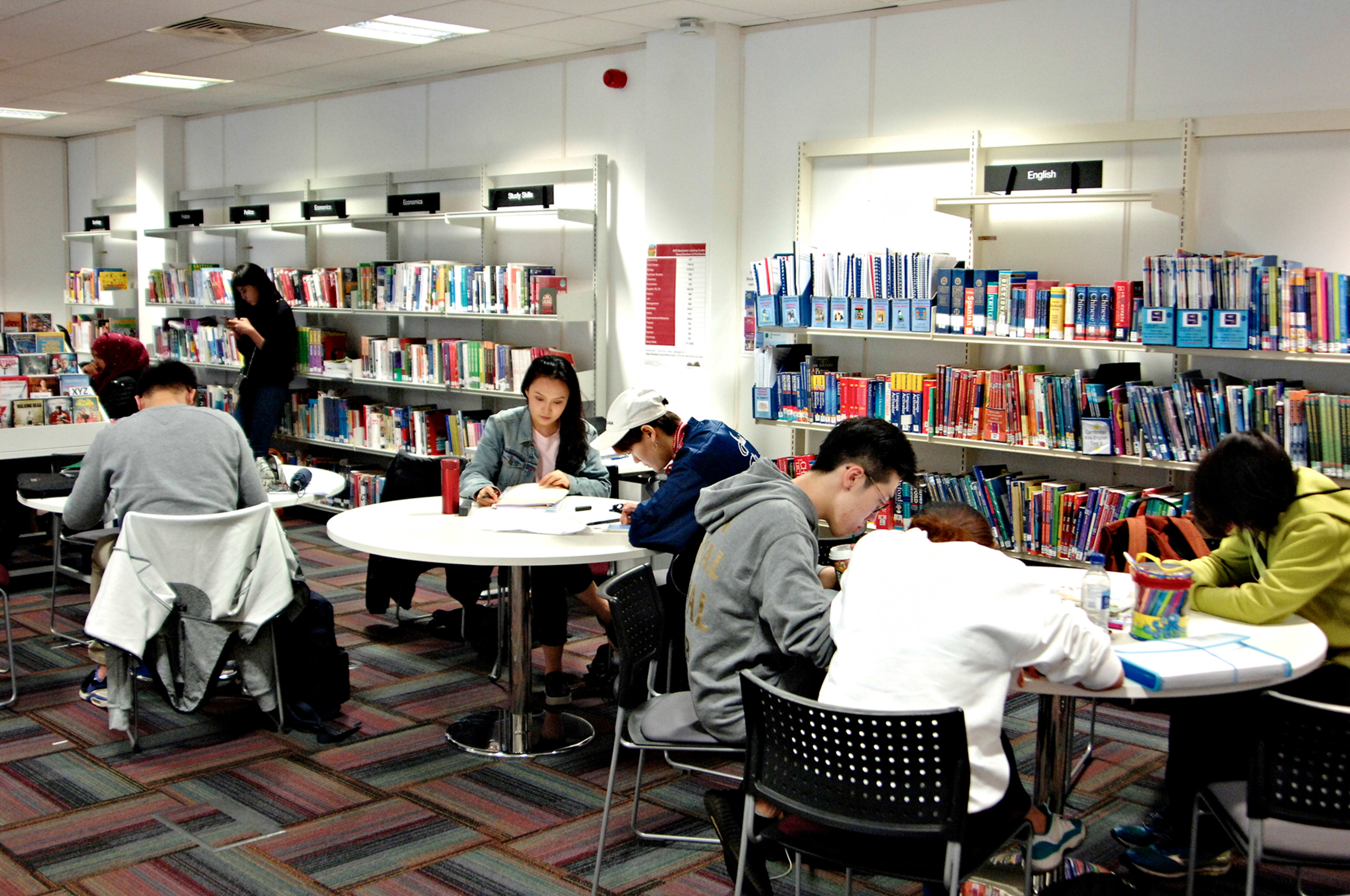 International students working in the INTO Learning Resource Centre