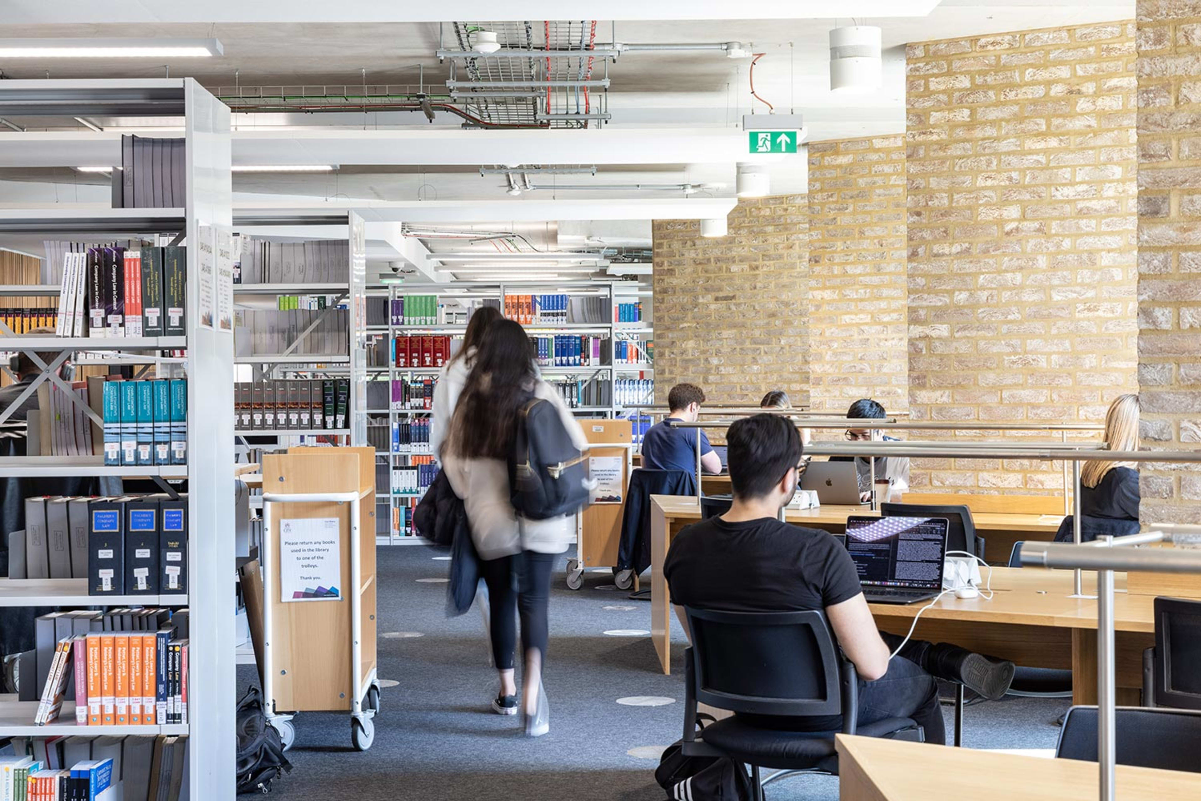 Students studying in the library at City, University of London