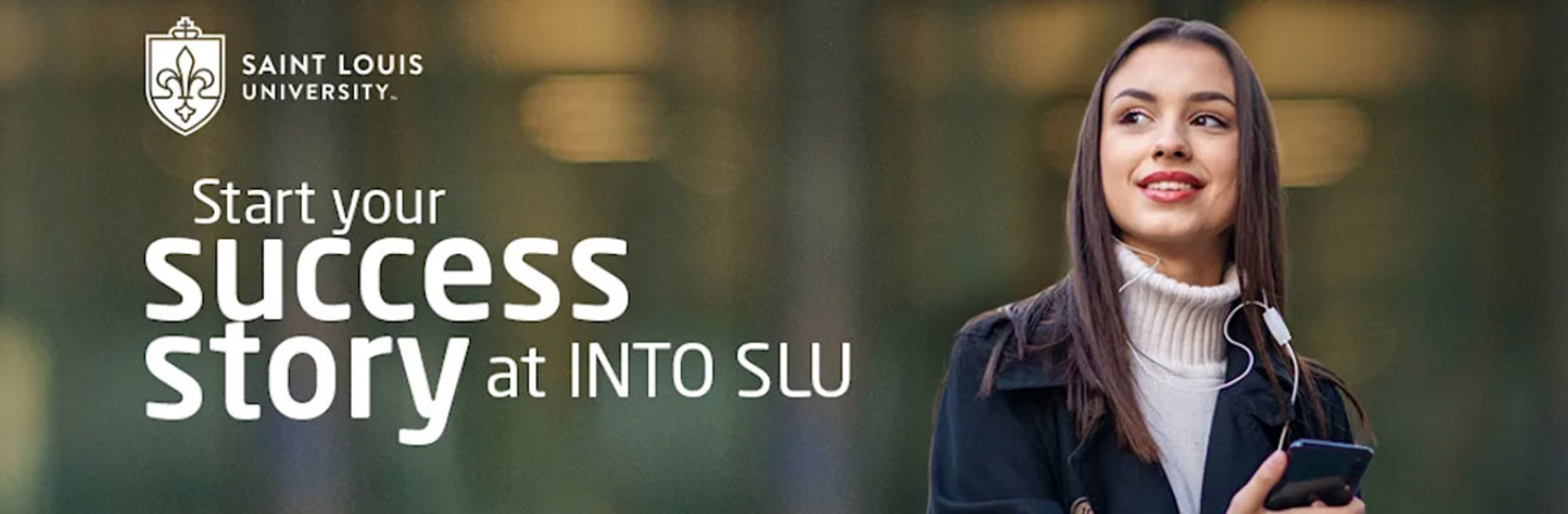 Start your Success story at INTO SLU student looking at sign