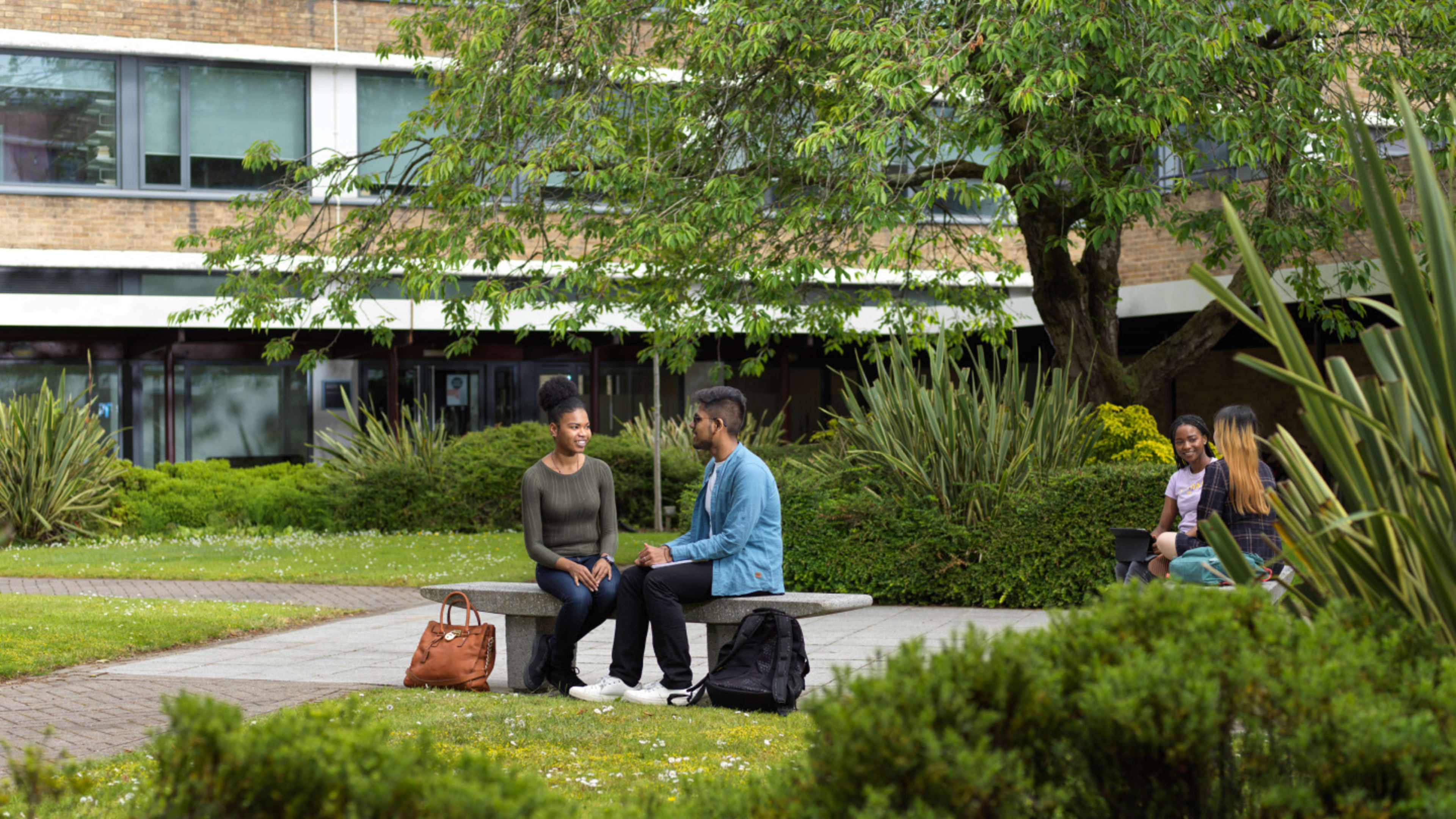 Image of students sitting in Lancaster University campus