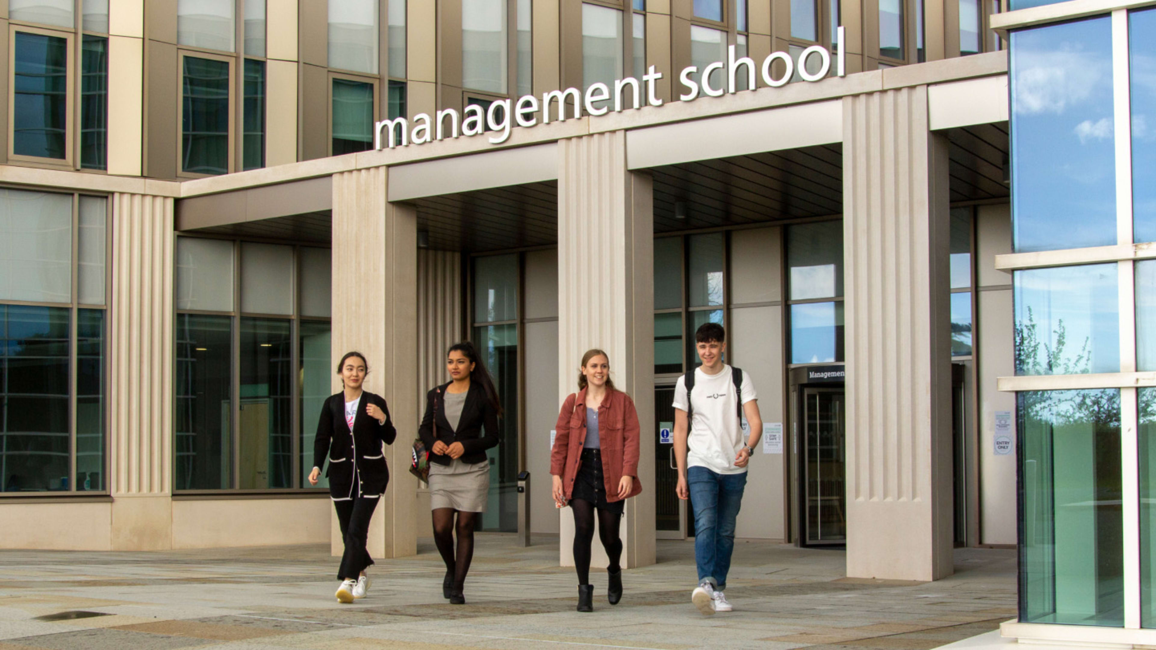 Image of students outside Lancaster University Management School