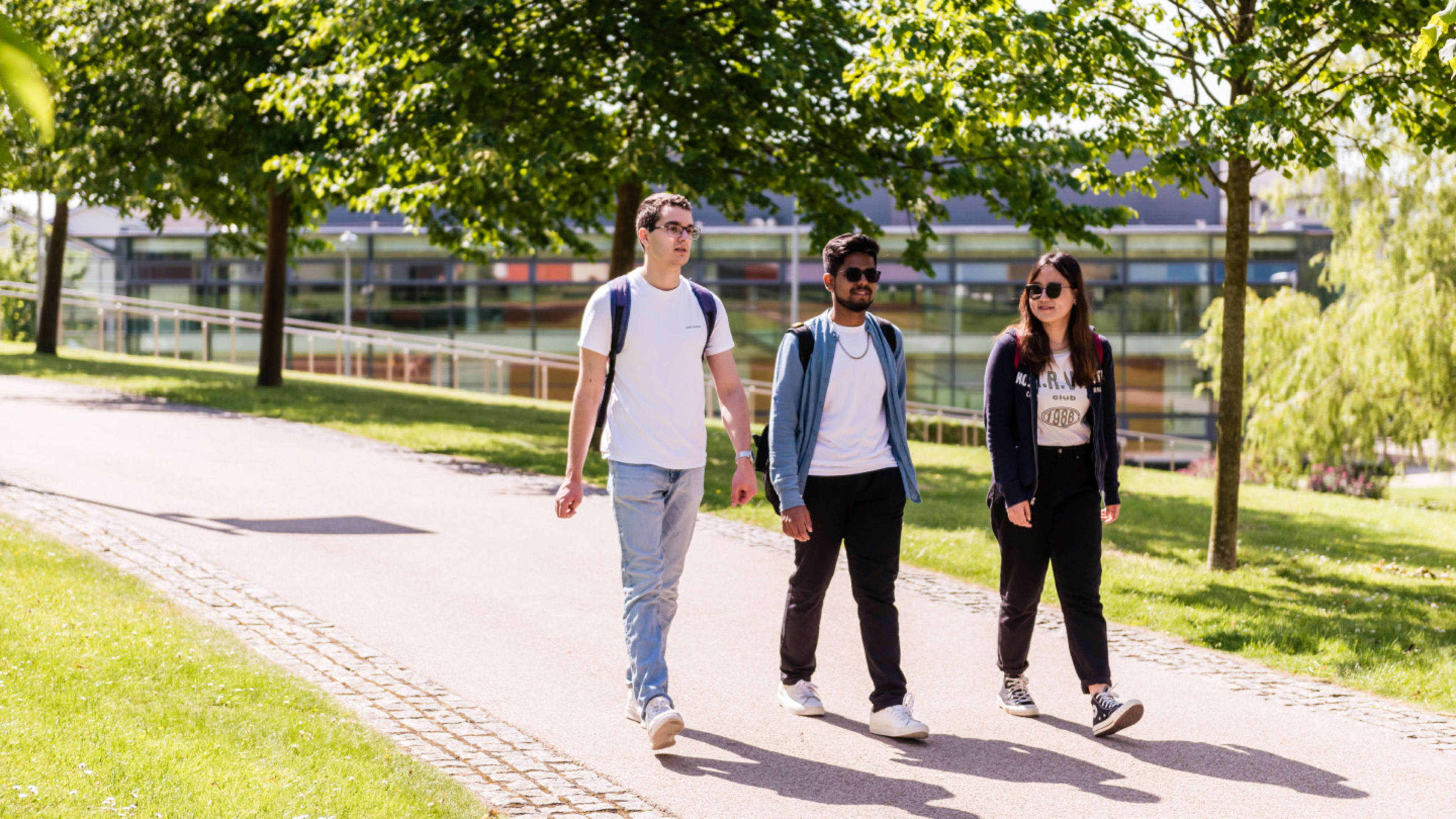 Image of students walking around Lancaster University campus