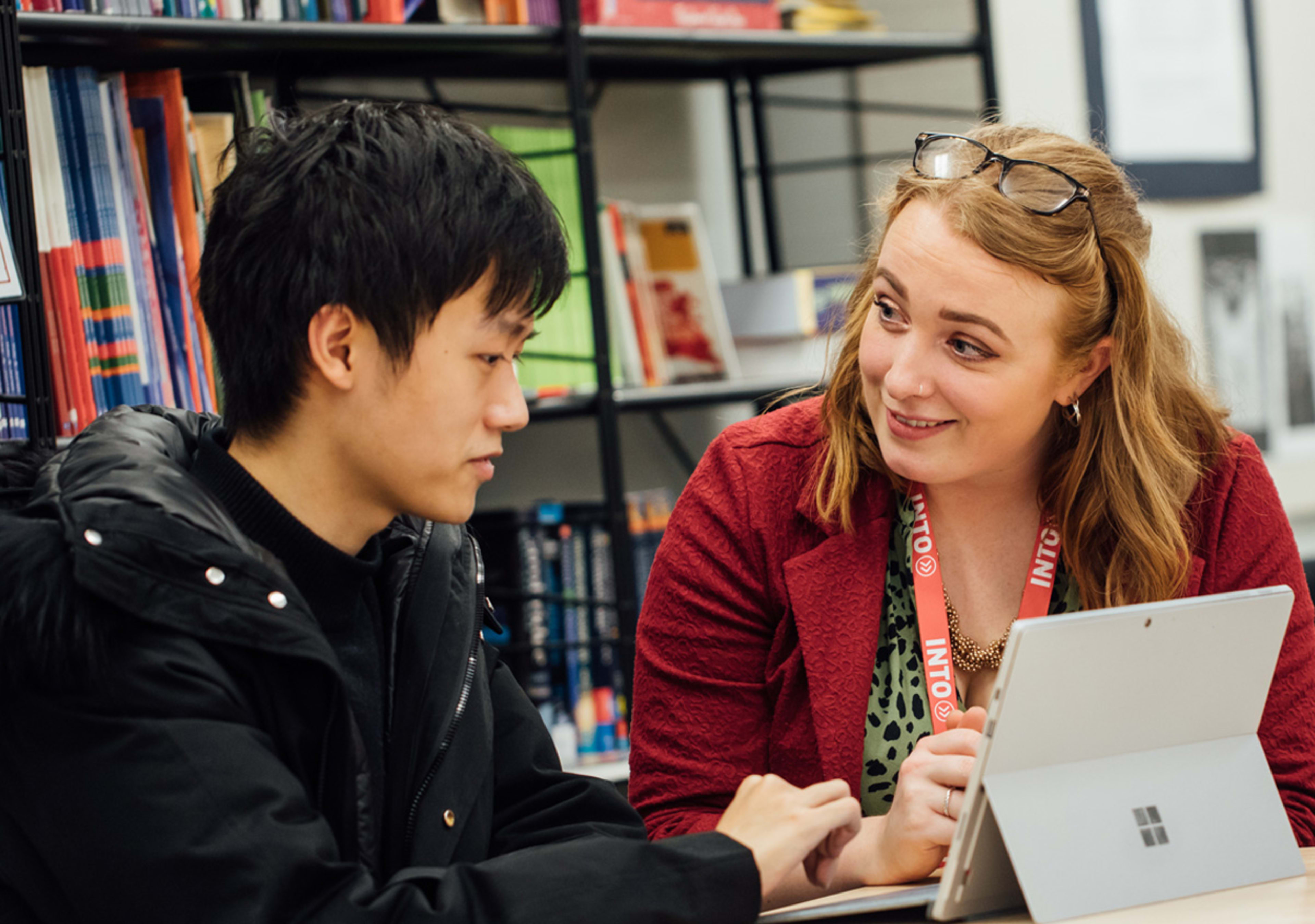 Student with INTO support staff