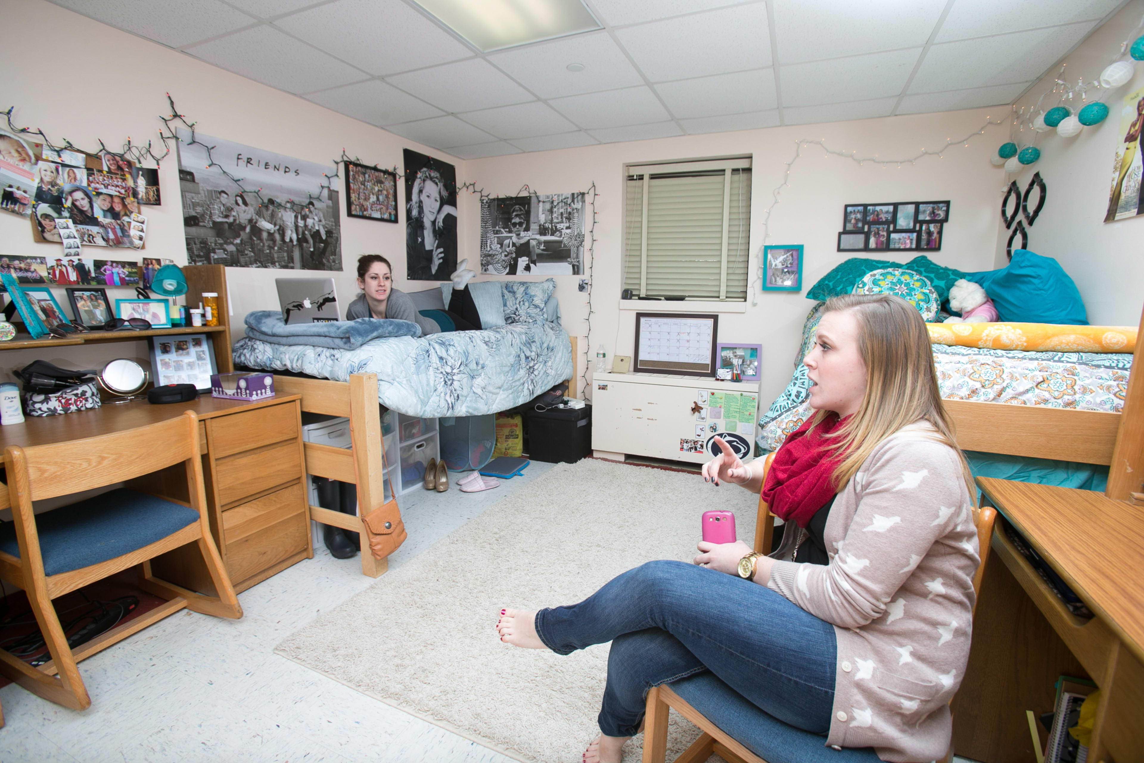 Interior of Hofstra dorm room with students