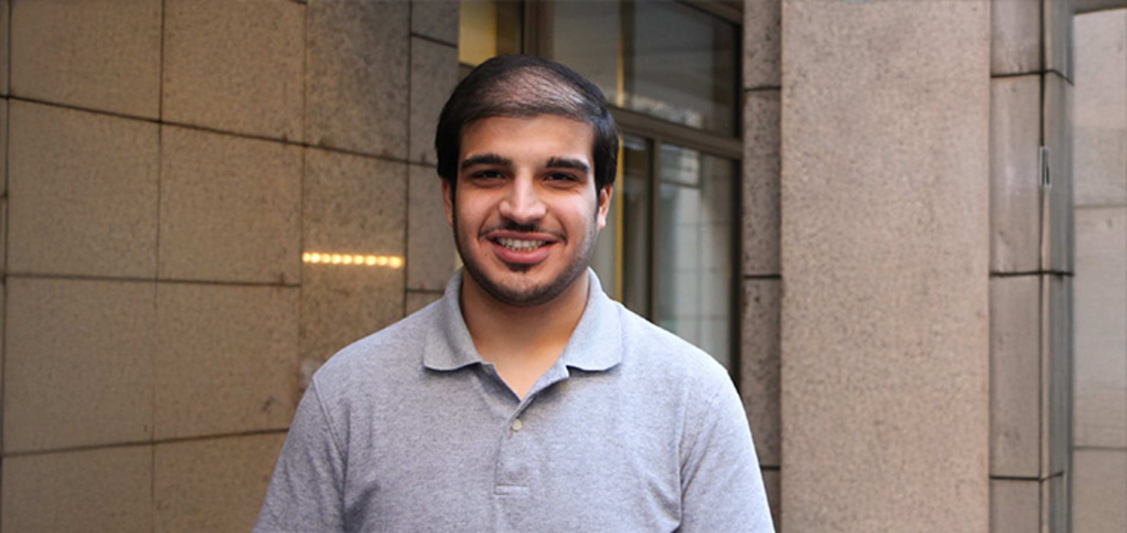 Student in front of a building