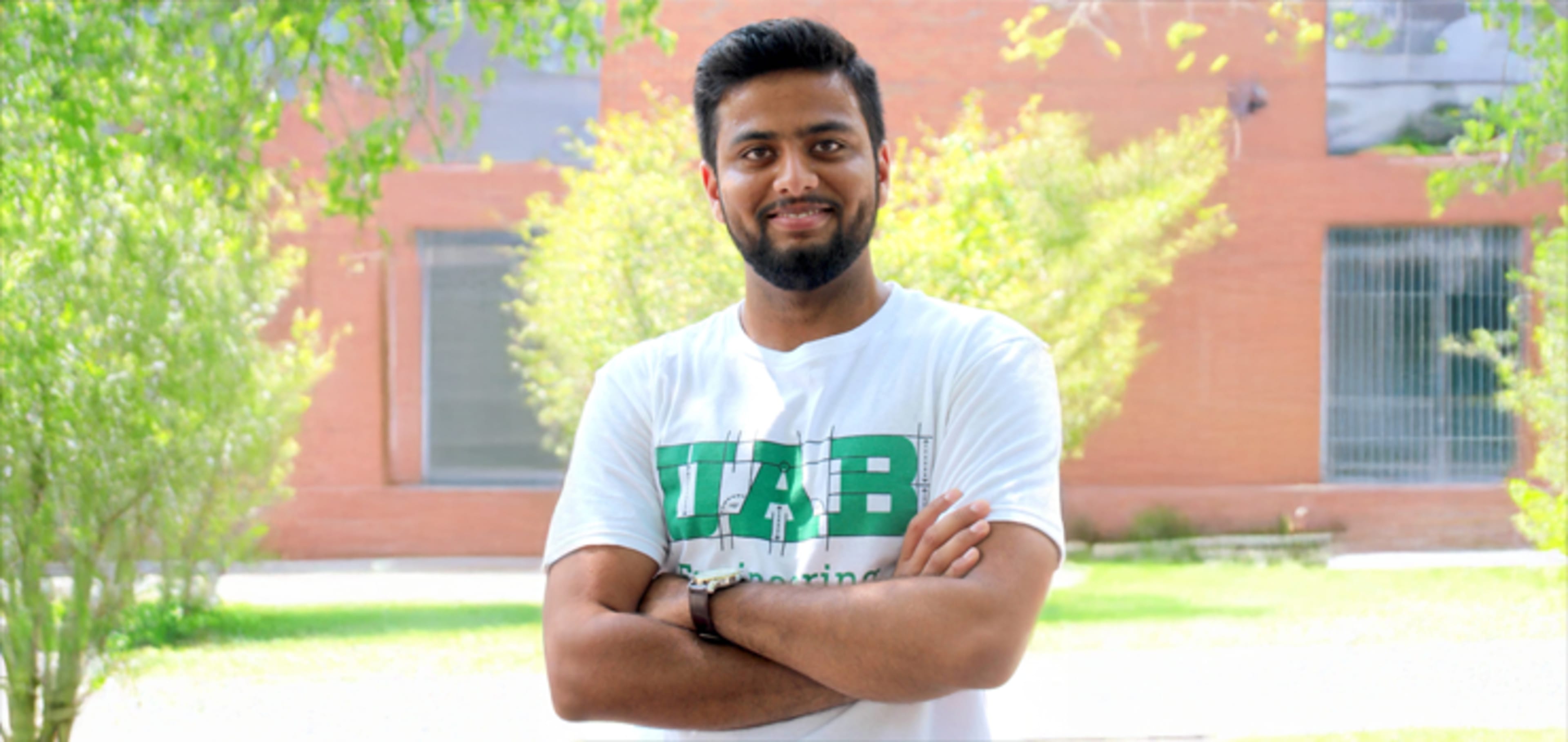 Student in front of a buillding