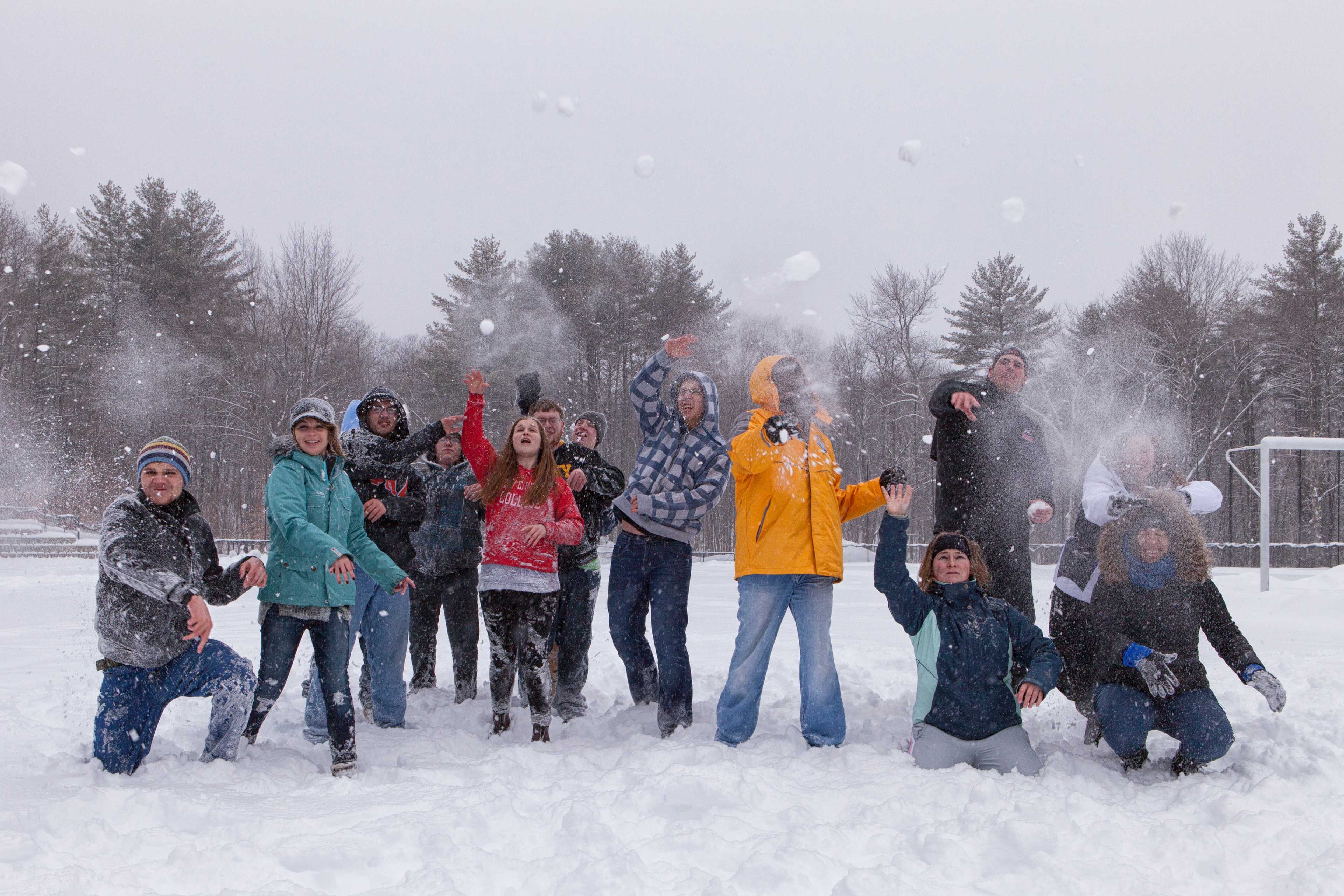 Students having snowball fight
