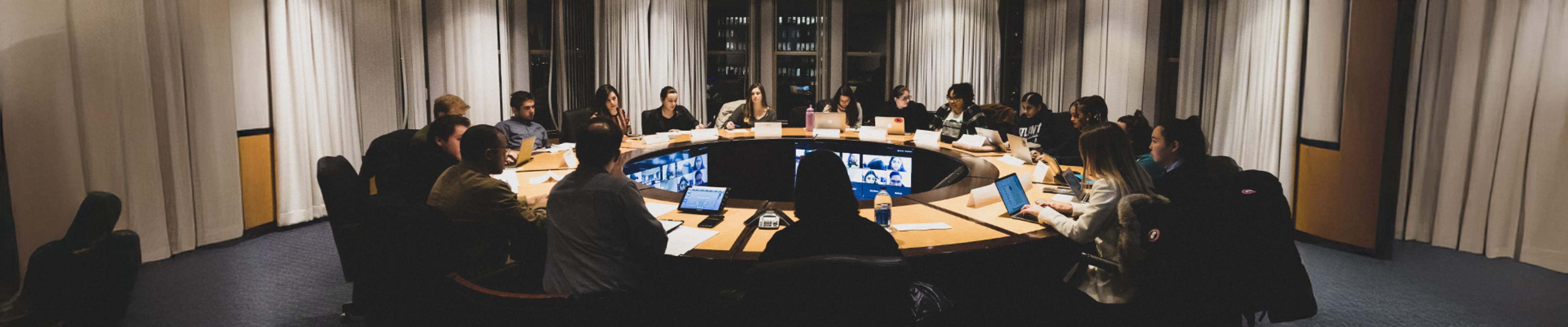 Students sitted around a round table