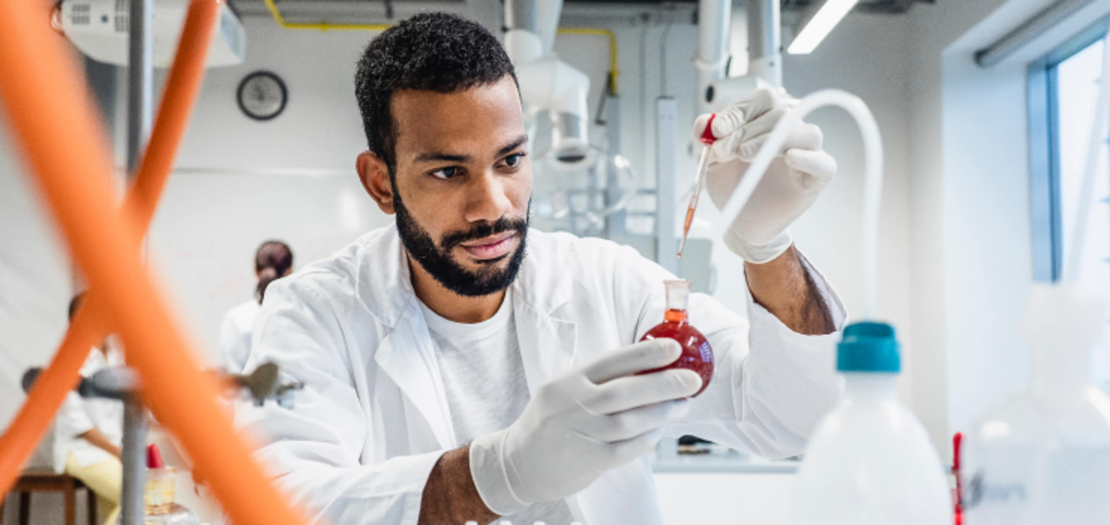 International student doing his laboratory activity