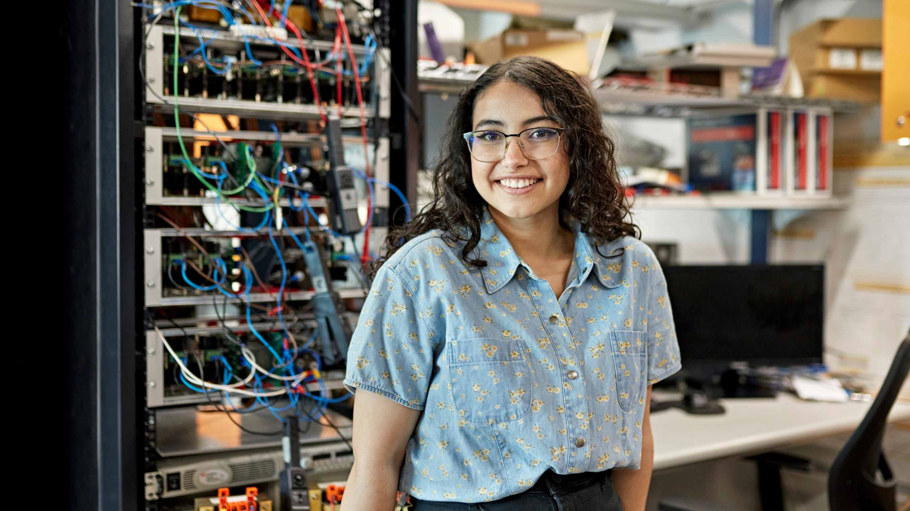 International student inside a computer data lab