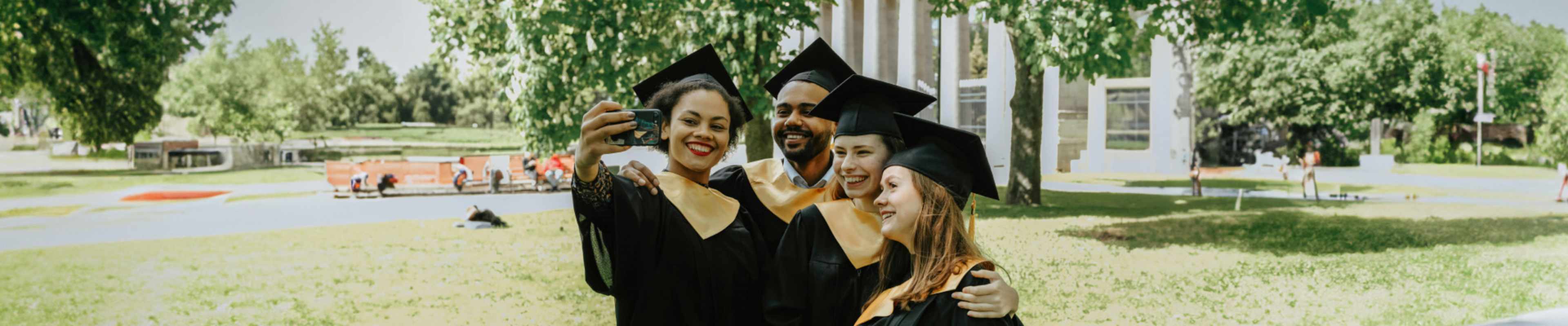 International students taking picture during their graduation