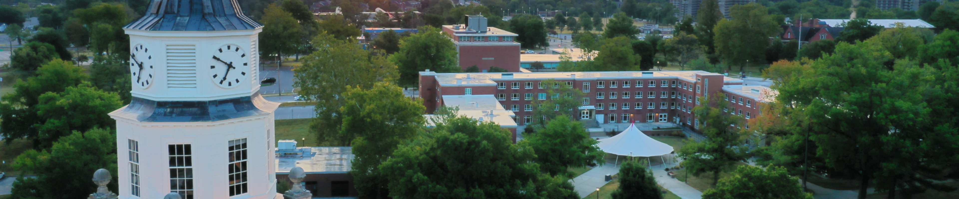 Sun setting over campus clocktower 