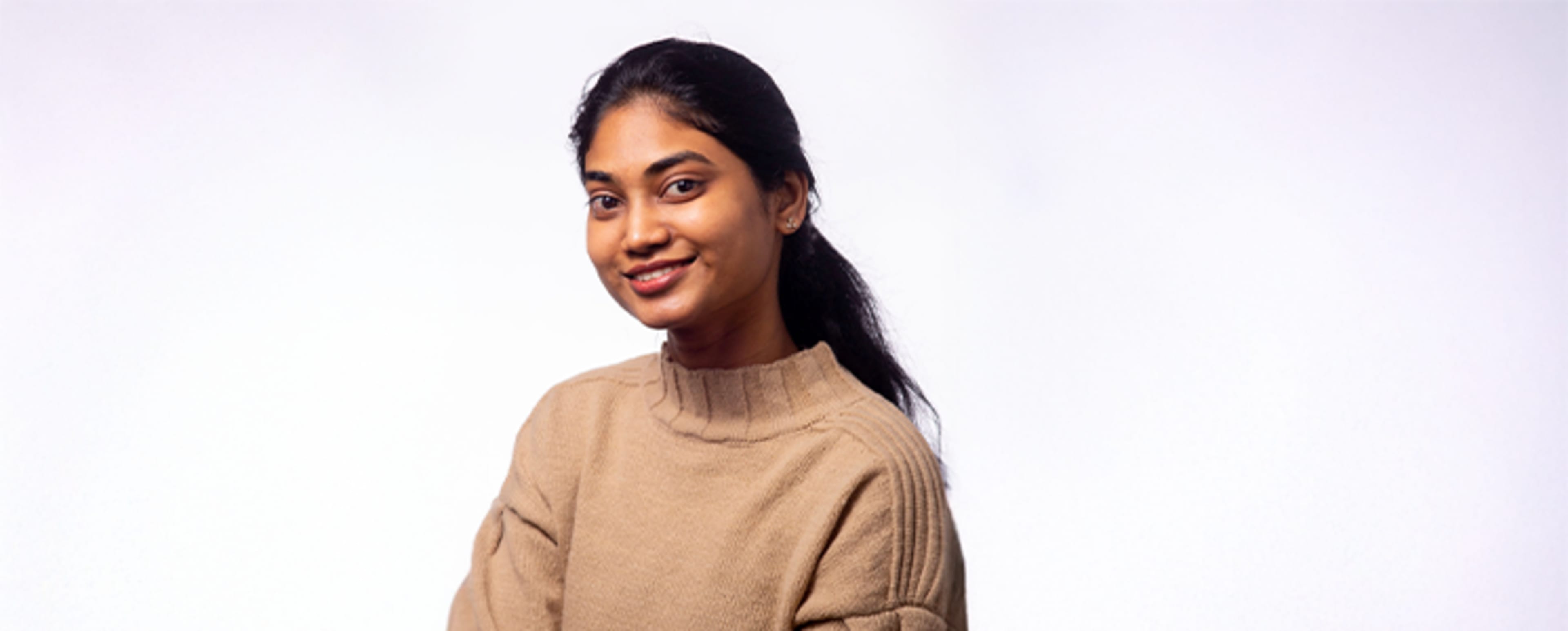 Yamini smilling at the camera