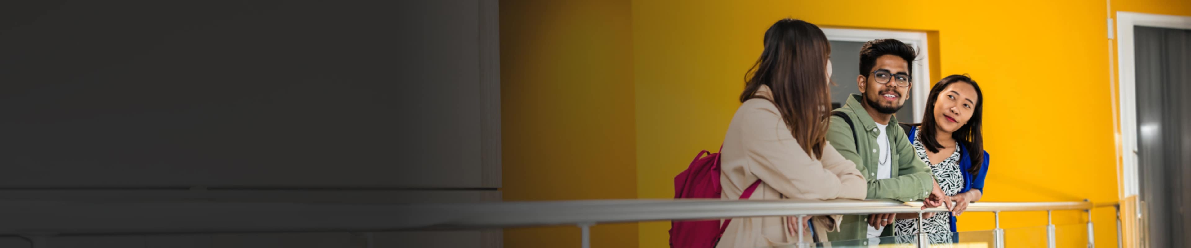 International students hanging out together in Lancaster University hallway