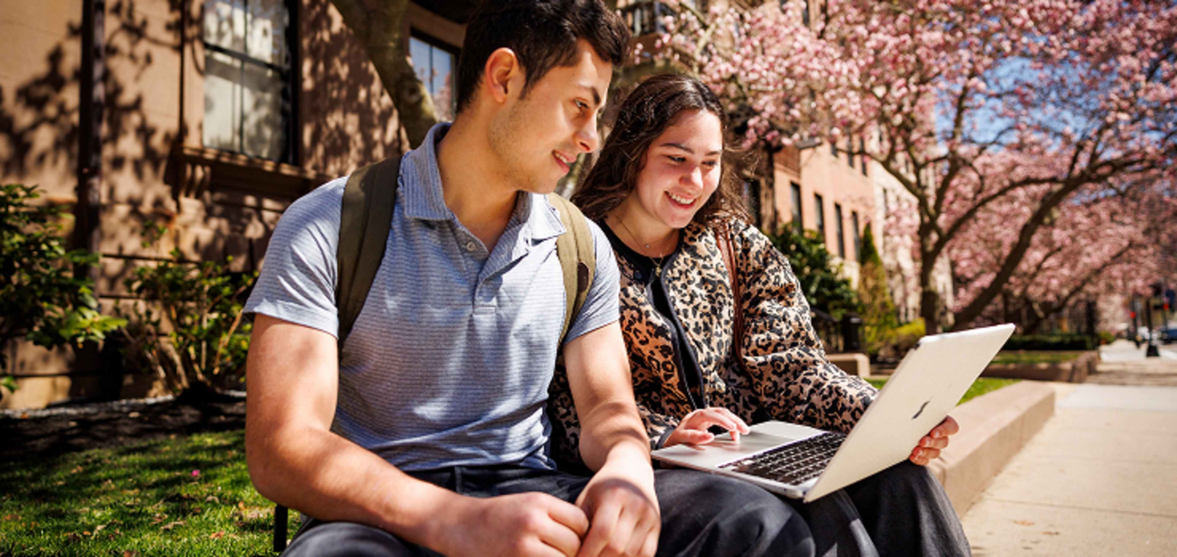 Students looking at the computer