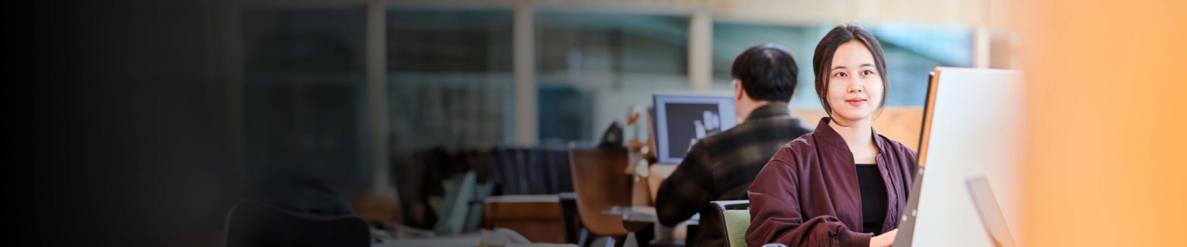 International student focused on camera shot