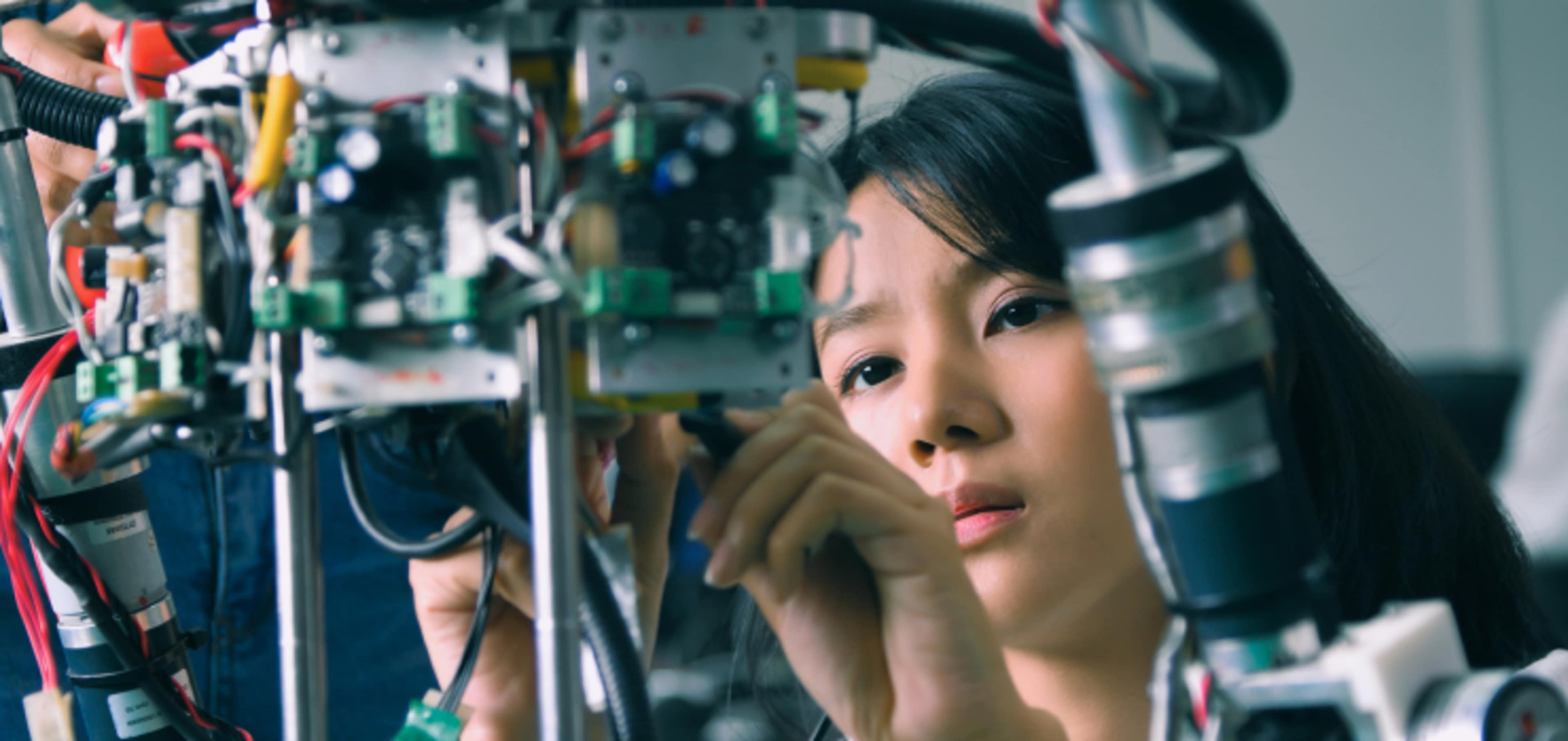 Engineering student working on robotic project
