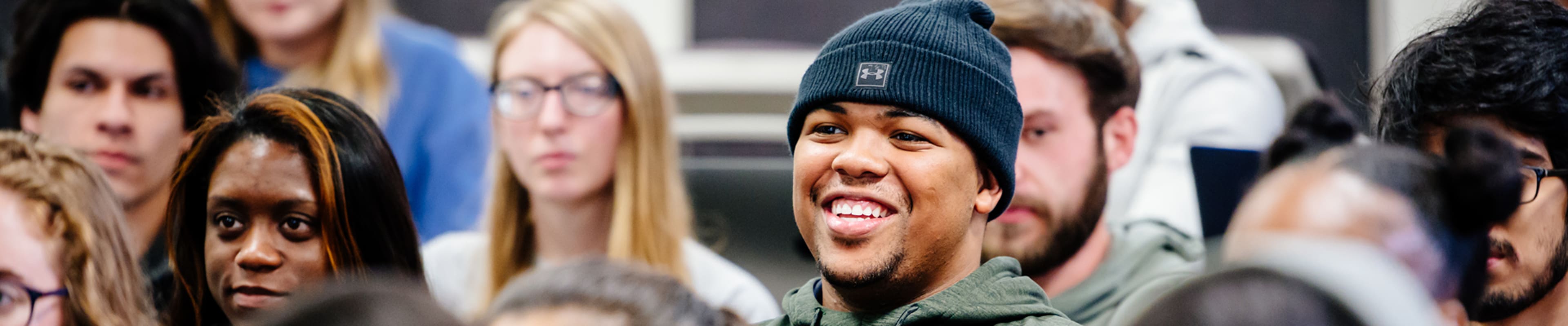 Crowd of students paying atenttion to a lesson