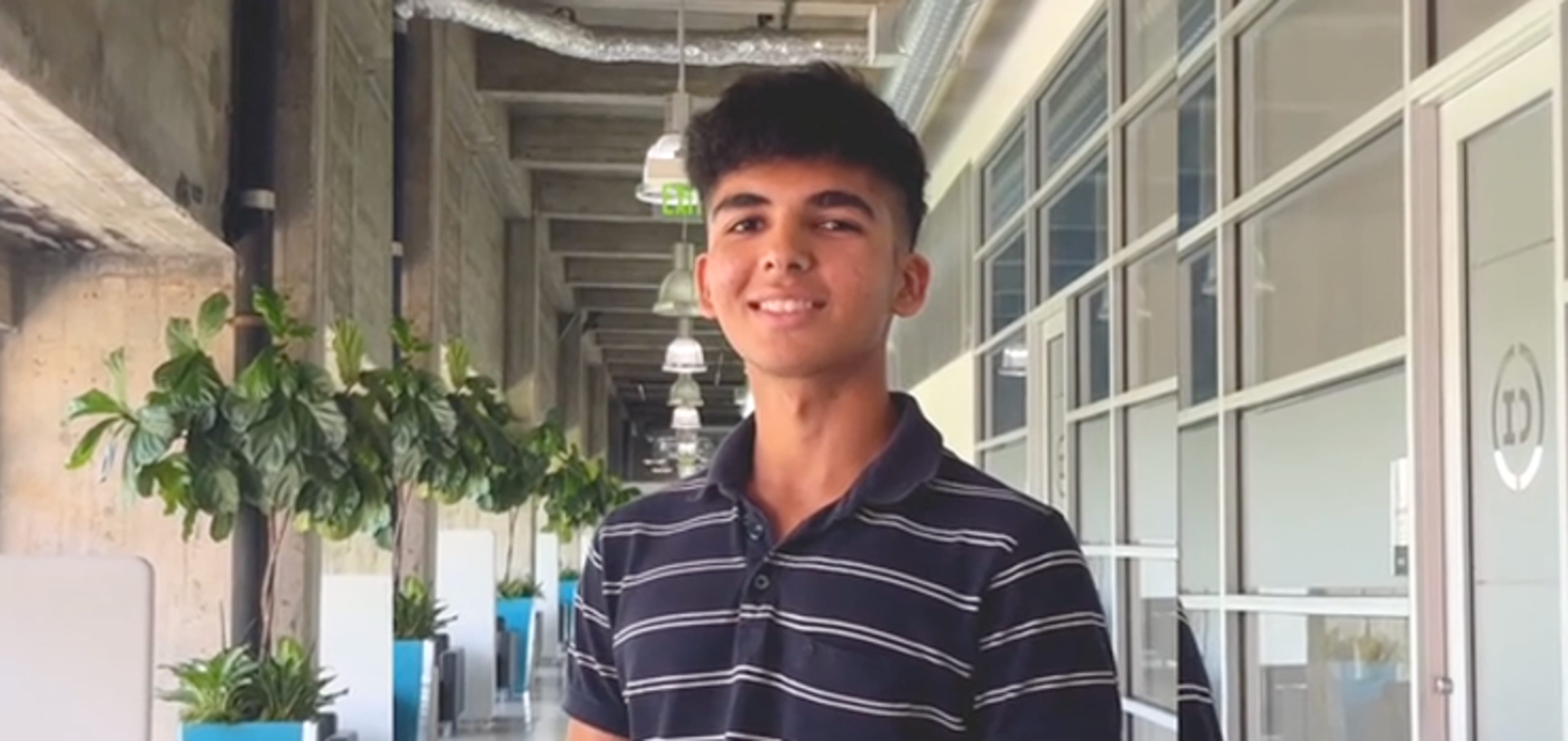 Student smiling to the camera