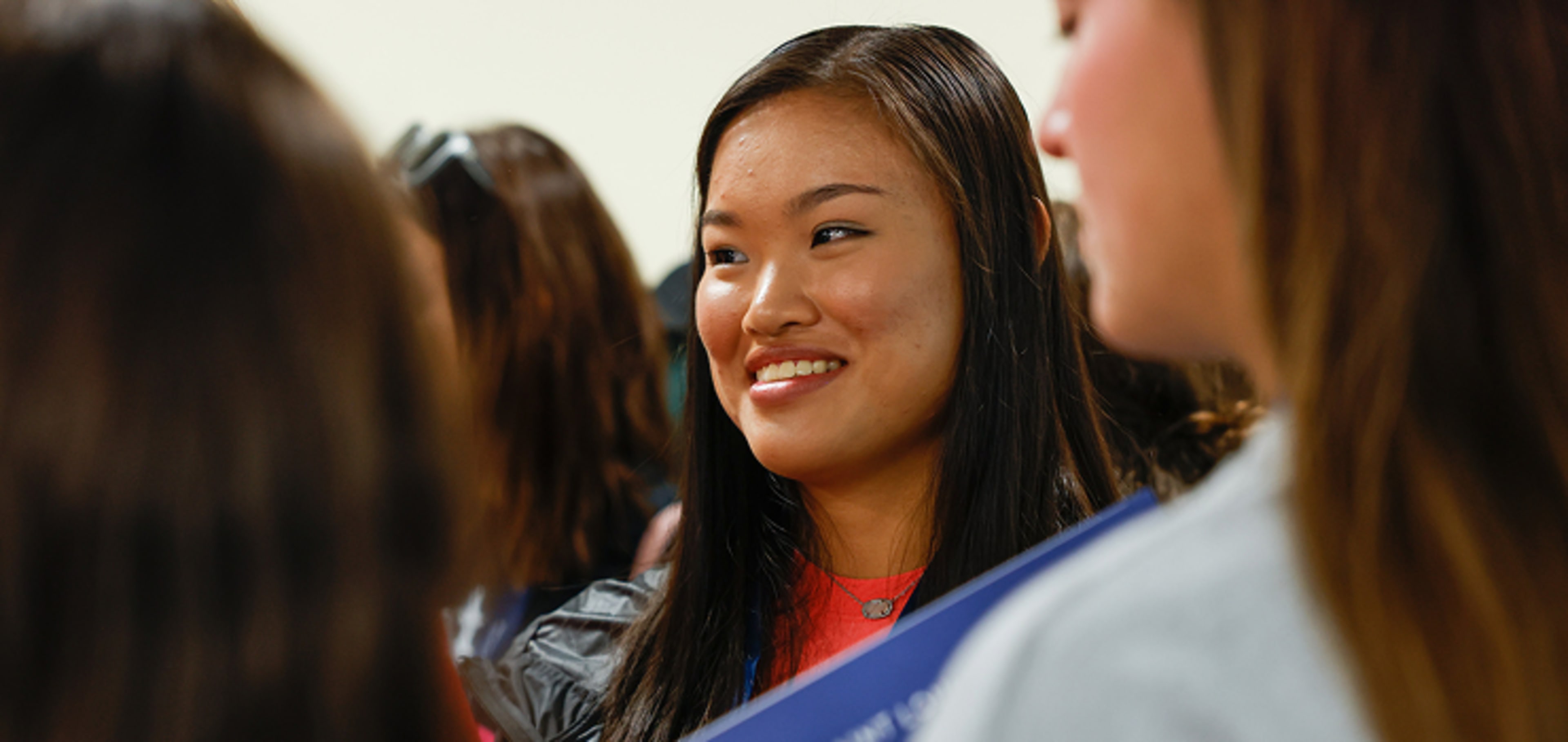 Student tanking a lesson whike smilling