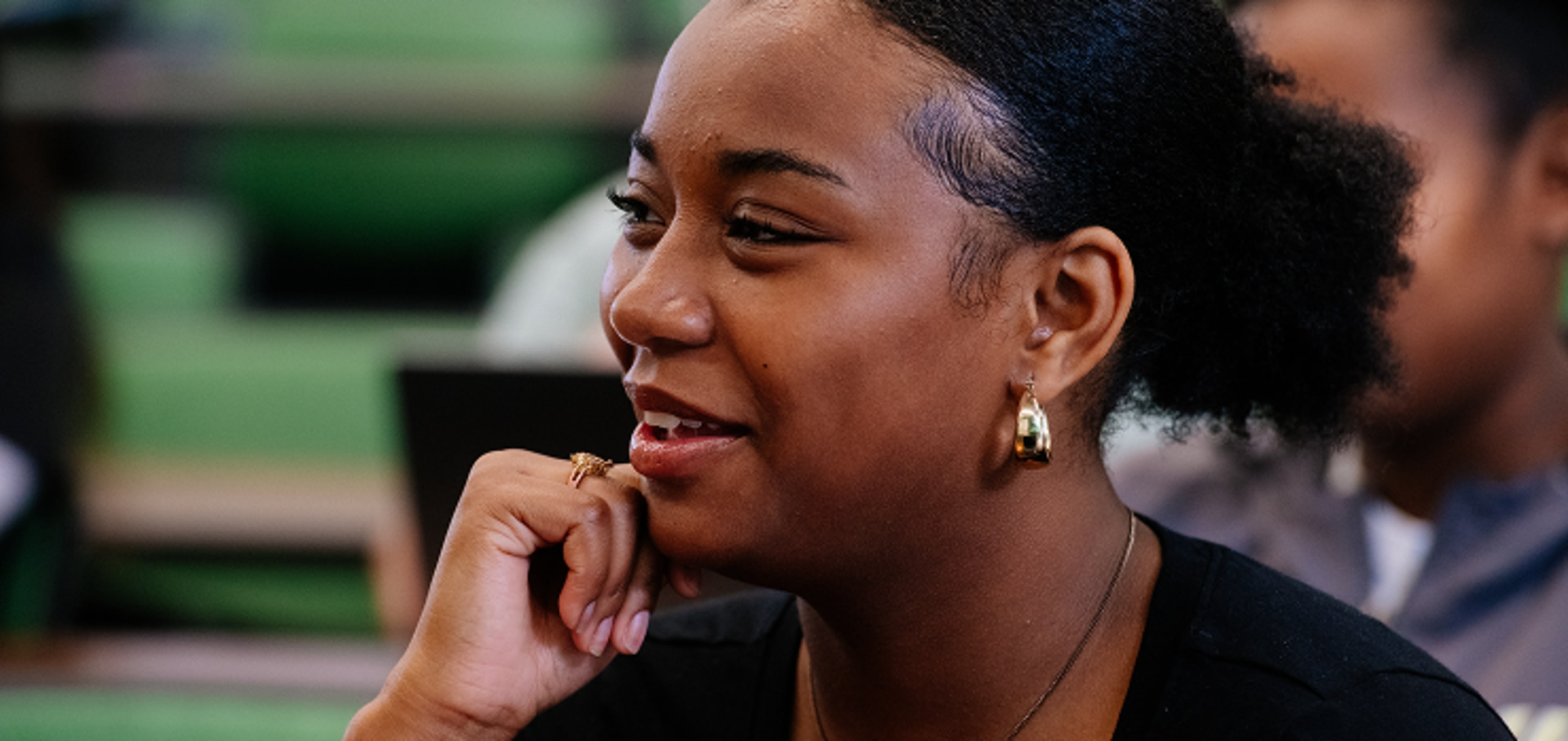 A woman looking at her side